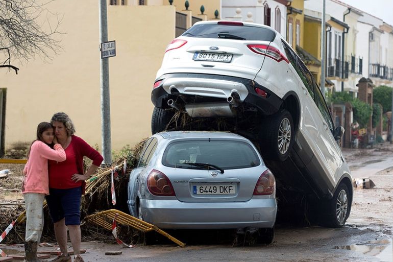 Floods tear through southern Spain, killing a firefighter
