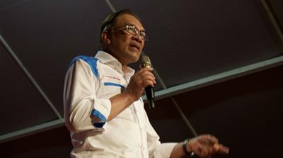 Anwar Ibrahim campaigns for election in the seaside town of Port Dickson in Malaysia [Kate Mayberry/Al Jazeera]
