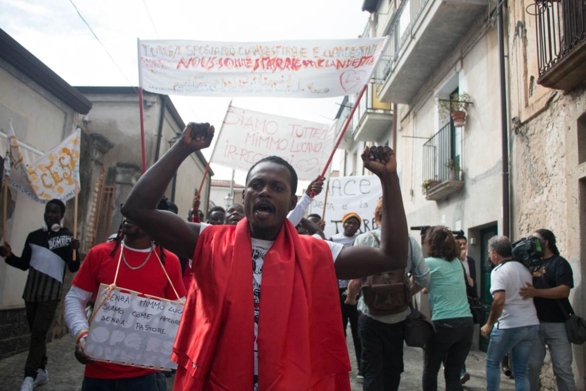 Refugees who live in the town were at the forefront of the demonstration, shouting “Freedom for Mimmo”.