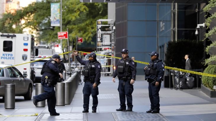 New York City Police Dept. officers arrive outside the Time Warner Center, in New York, Wednesday, Oct. 24, 2018. A police bomb squad was sent to CNN''s offices in New York City and the newsroom was e