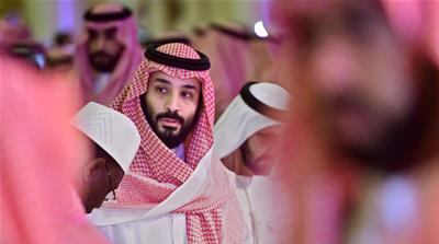 MBS said in his first public remarks that Saudi Arabia is working to bring justice to Khashoggi's killers [Giuseppe Cacace/AFP]