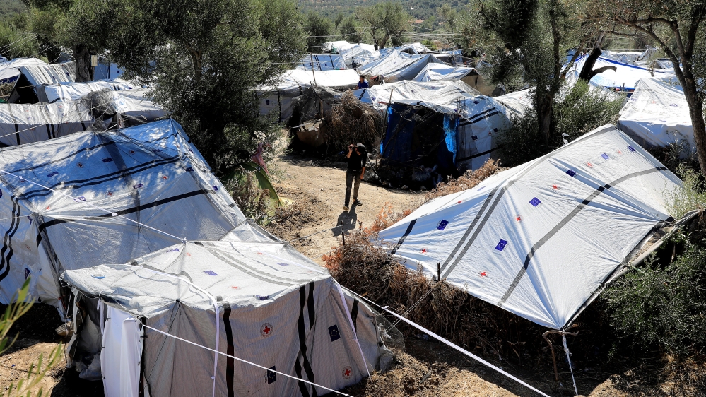 Tents at a makeshift camp next to the Moria camp for refugees and migrants on the island of Lesbos [Giorgos Moutafis/Reuters]