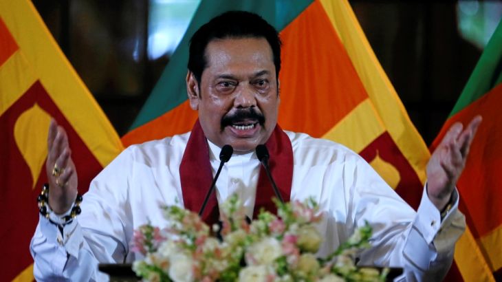 Sri Lanka''s newly appointed Prime Minister Rajapaksa addresses the gathering during the ceremony to assume his duties as the Minister of Finance and Economic Affairs at the Finance Ministry in Colombo