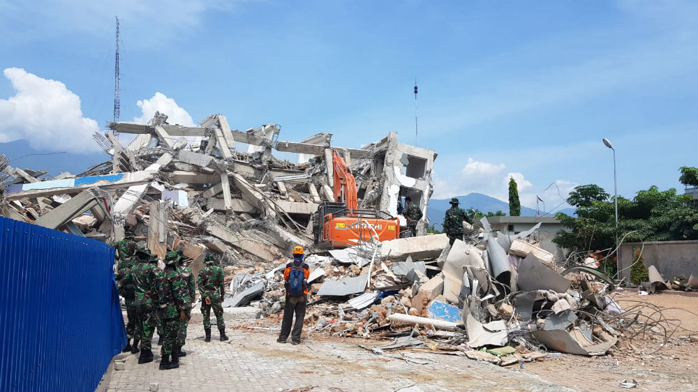 
Denny Liem, 41, owner of the Roa Roa Hotel, said among 30 people believed trapped is a Korean member of a paragliding team [Ted Regencia/Al Jazeera]
