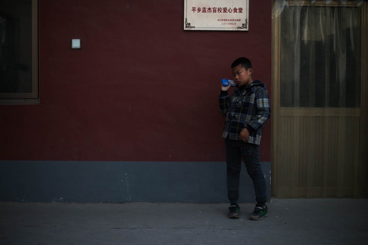 "Before we had radios I used to miss my parents and cry at night. Now I listen to the stories and don''t miss home." Mingming, a student at Mu Mengjie School for the Blind.