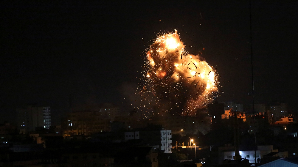 An Israeli air attack destroyed the building of Hamas' Al-Aqsa TV station in Gaza City on Monday [Adel Hana/AP]