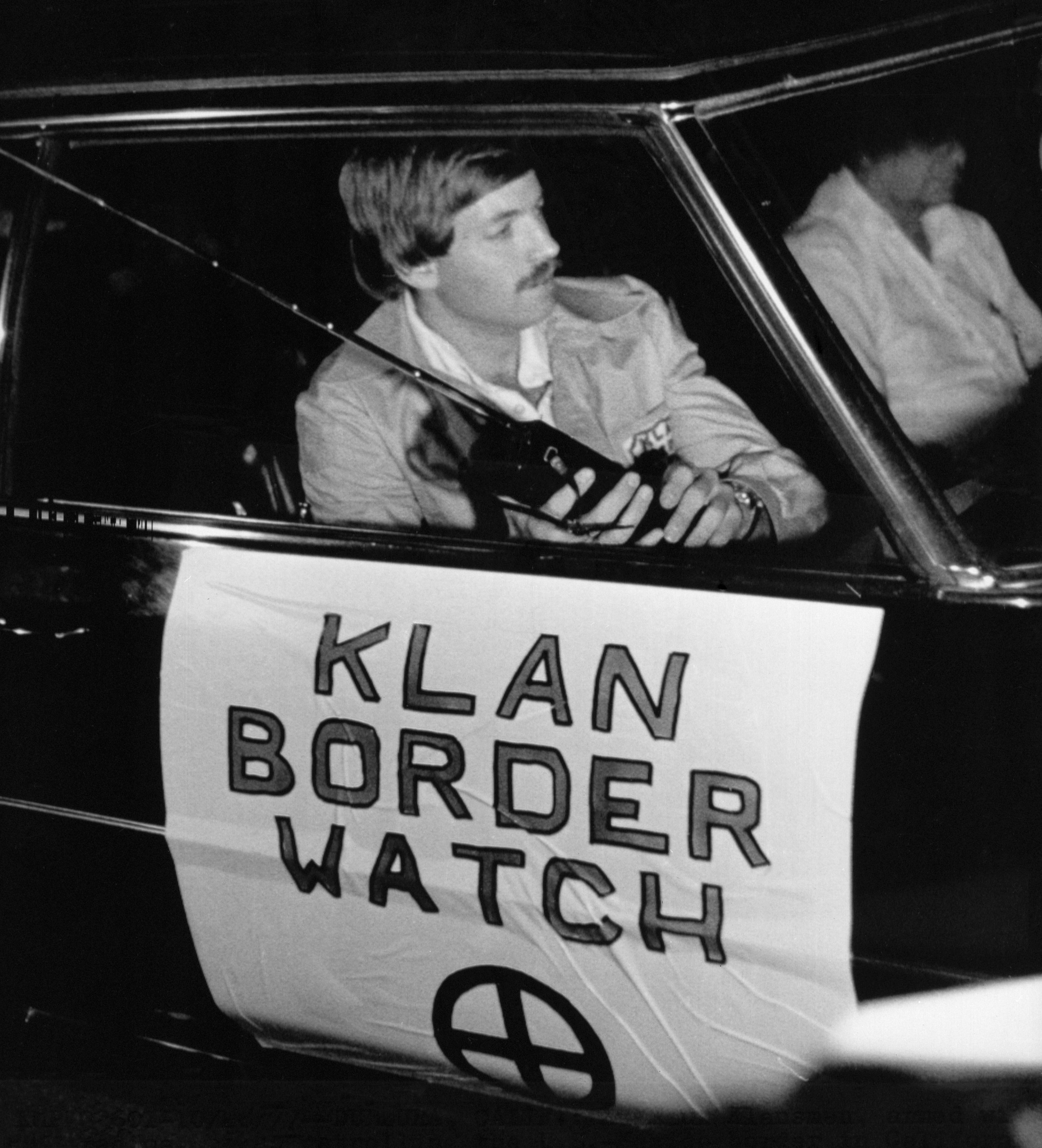 David Duke, then-leader of the Ku Klux Klan, patrols the California-Mexico border for immigrants in a 'Klan Border Watch' vehicle [Getty Images]
