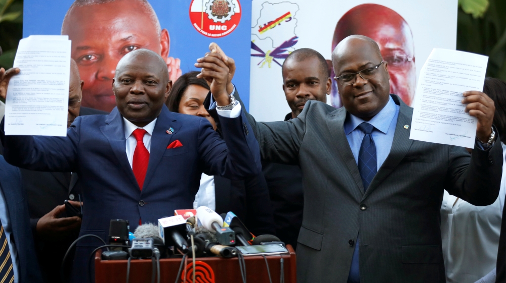 Vital Kamerhe (left) and Felix Tshisekedi (right) at a joint news conference in Nairobi [Baz Ratner/Reuters]