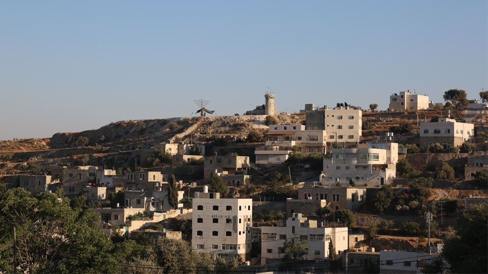 An Israeli military watchtower overlooks the city of Hebron, home to 200,000 Palestinians [Mersiha Gadzo/Al Jazeera]