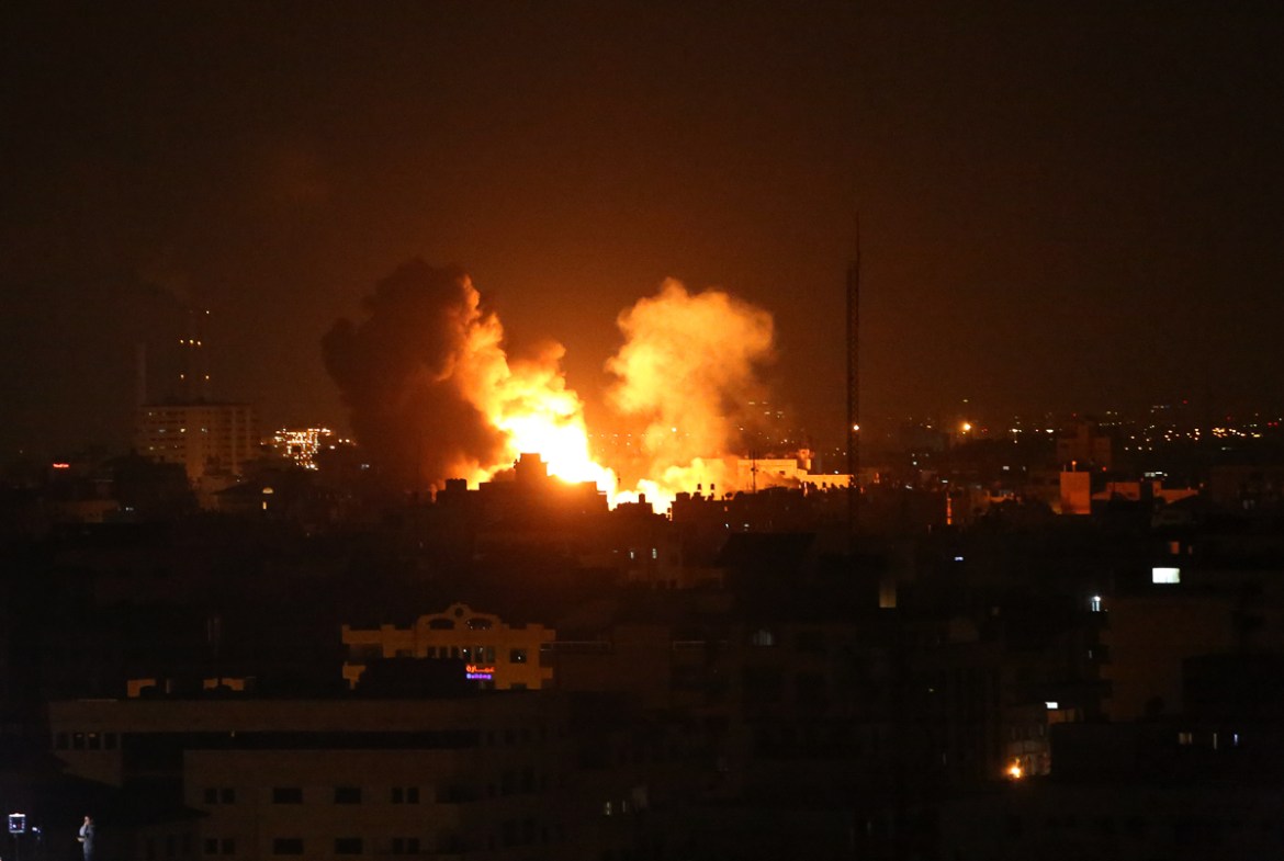 An explosion caused by Israeli airstrikes on Al-Rahma building in Gaza City, Monday, Nov. 12, 2018. Palestinian militants on Monday fired dozens of rockets and mortar shells into southern Israel, and
