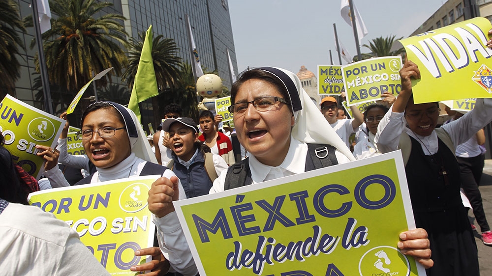 Demonstrators participate in the 7th 'March for Life', an anti-abortion rights protest demanding authorities to suspend pro-abortion rights policy, in Mexico City [Sashenka Gutierrez/EPA-EFE]