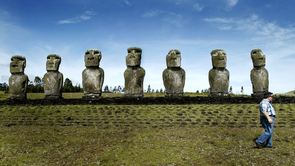 The moai are an iconic symbol of Easter Island [Carlos Barria/Reuters]