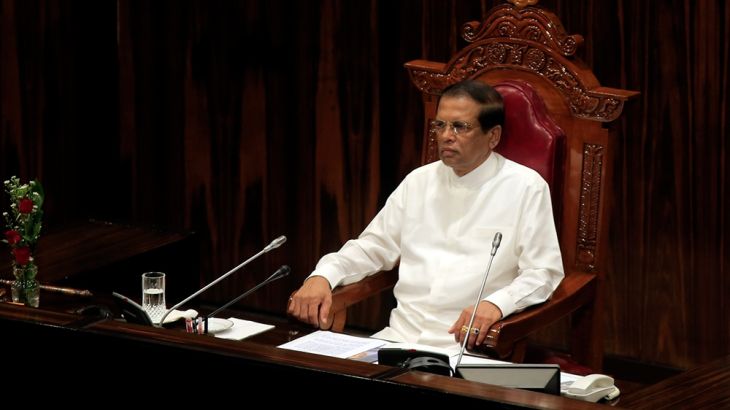 Sri Lankan President Maithripala Sirisena watches during the inauguration of the second session of the 8th parliament in Colombo, Sri Lanka, Tuesday, May 8, 2018. (AP Photo/Eranga Jayawardena)