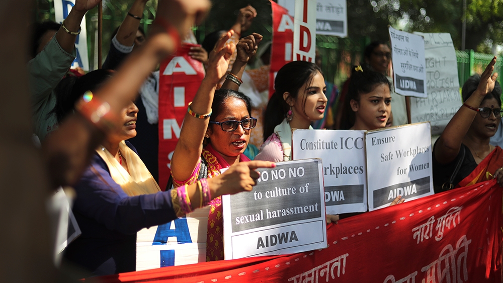 Indian women shout slogans during a protest against sexual harassment in the workplace in New Delhi [File: Manish Swarup/The Associated Press]