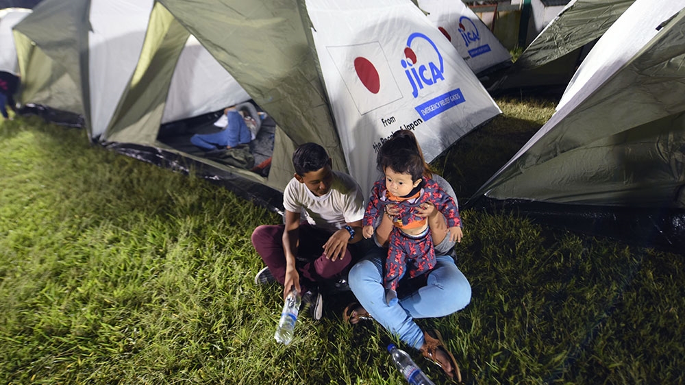 Residents of several communities nearby the erupting Fuego volcano, stay at a temporary shelter in Escuintla department, 35 km south of Guatemala City [Johan Ordonez/AFP]