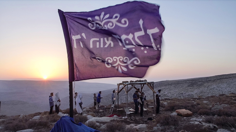 Members of the Hilltop Youth at the Maoz Esther outpost, near the settlement of Tapuach [Al Jazeera]