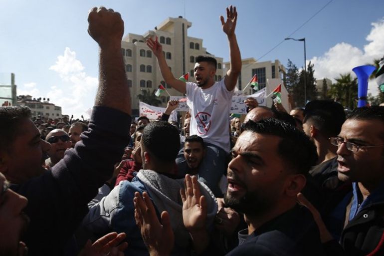 Palestinians protest social security law