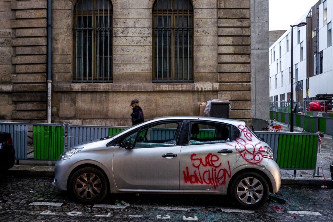 A vandalized car is seen parked on a street near the Champs ElysE`es where protesters and police forces clashed during last Saturdayi´s protests on December 03, 2018 in Paris, France. While the final
