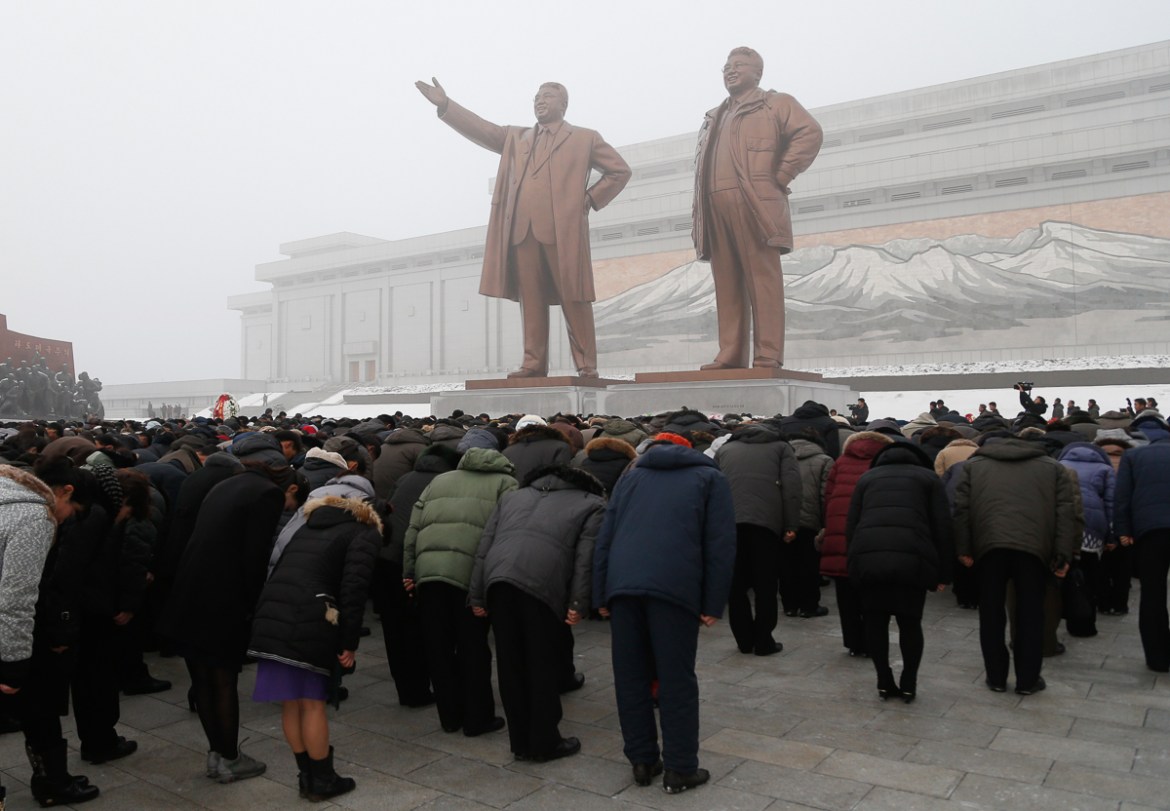 North Korean bow at the bronze statues of their late leaders Kim Il Sung and Kim Jong Il at Mansu Hill Grand Monument in Pyongyang, North Korea, Monday, Dec. 17, 2018. North Koreans are marking the se