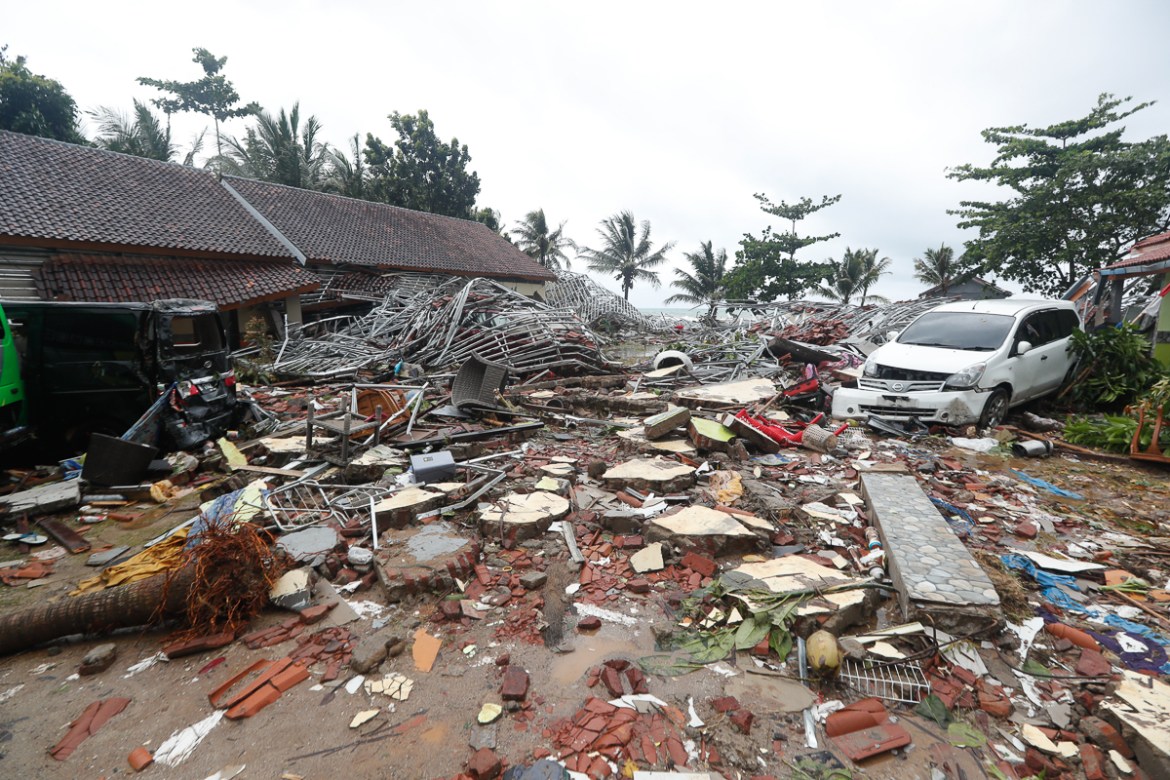 A view of damage with a car sitting among debris after a tsunami hit the Sunda Strait in Pandeglang, Banten, Indonesia, 23 December 2018. According to the Indonesian National Board for Disaster Manage