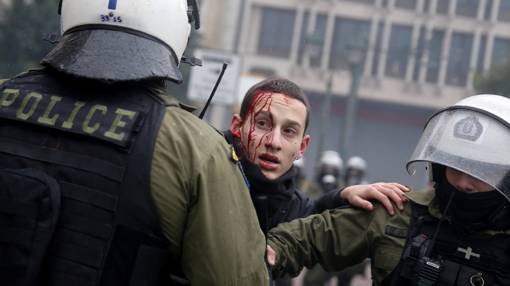 At least 30 protesters have been taken into custody [Costas Baltas/Reuters]