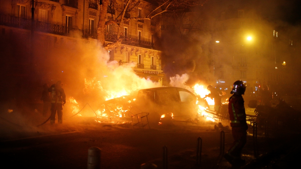 Protesters torched scores of vehicles in Paris on Saturday [File: Stephane Mahe/ Reuters]