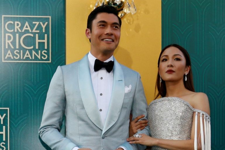 FILE PHOTO: Cast members Golding and Wu pose at the premiere for "Crazy Rich Asians" in Los Angeles