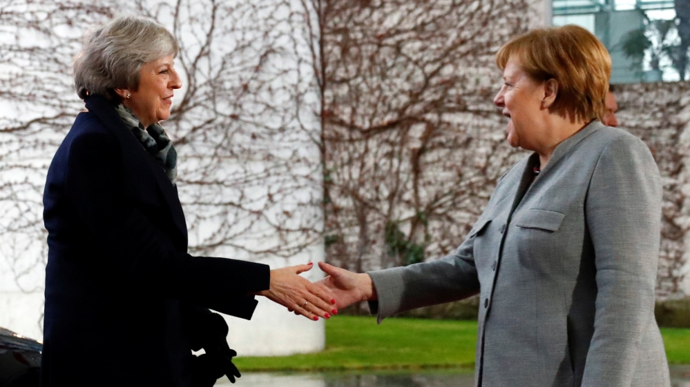 British Prime Minister Theresa May met German Chancellor Angela Merkel in Berlin on Tuesday [Fabrizio Bensch/Reuters]