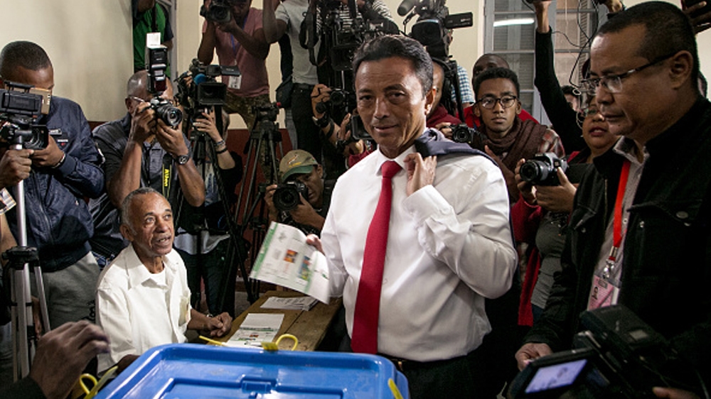 Presidential candidate Marc Ravalomanana casts his ballot during the second round of the presidential election [Rijasolo/AFP/Getty Images]