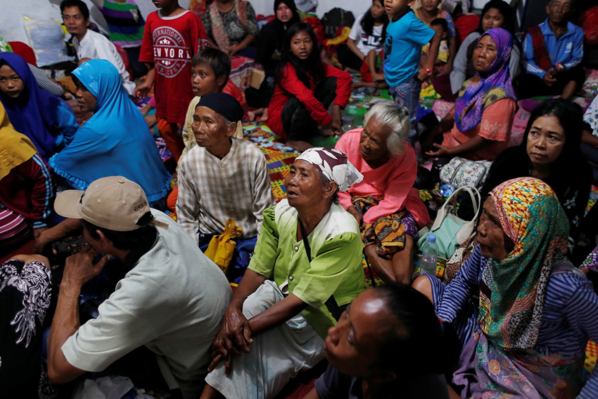 People rest at an evacuation centre at Sidamukti town hall after a tsunami hit Banten province, Indonesia December 24, 2018. Picture taken December 24, 2018. REUTERS/Jorge Silva -