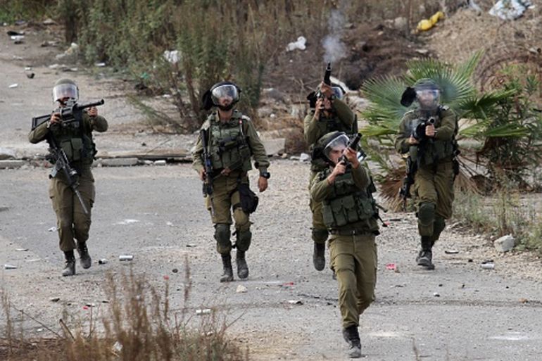 Protest against US decision to recognize Jerusalem as Israel''s capital TULKARM, WEST BANK - DECEMBER 18: Israeli forces intervene in Palestinian protesters during a demonstration against U.S.