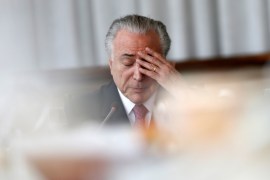 Brazil''s President Michel Temer reacts during a breakfast with foreign media at Alvorada Palace in Brasilia
