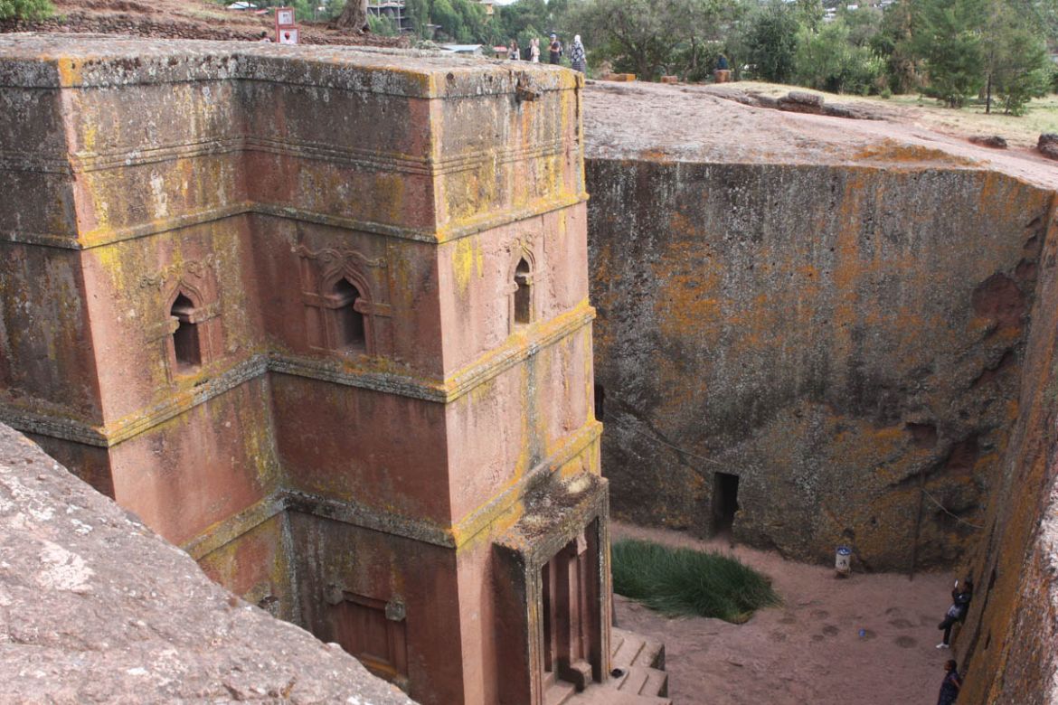 This isolated church dedicated to Saint George and carved in the shape of a symmetrical cruciform tower, standing about 15m in height, is arguably Lalibela’s most iconic sight and best photo opportuni