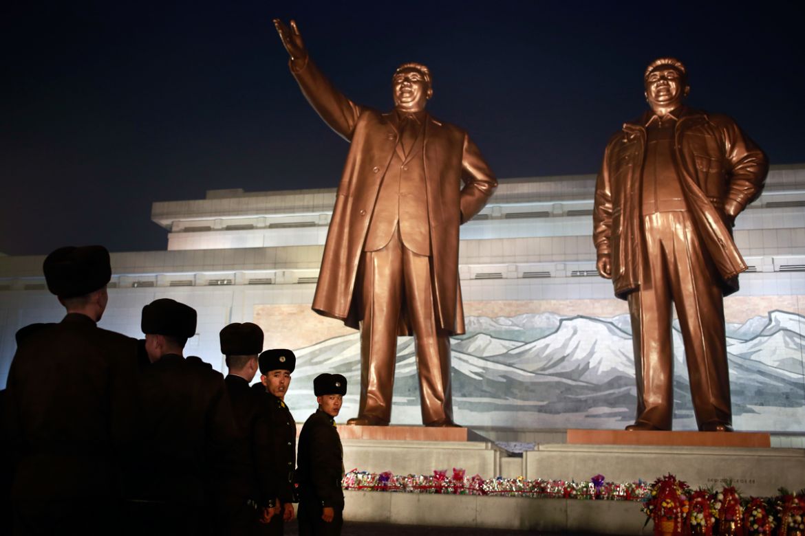 North Korean soldiers line up as they pay respect to the bronze statues of their late leaders Kim Il Sung and Kim Jong Il at Mansu Hill Grand Monument in Pyongyang, North Korea, Sunday, Dec. 16, 2018.