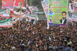 People gather with banners at the Suhrawardy Udyan for the maiden rally of opposition alliance called Jatiya Oikyafront in Dhaka