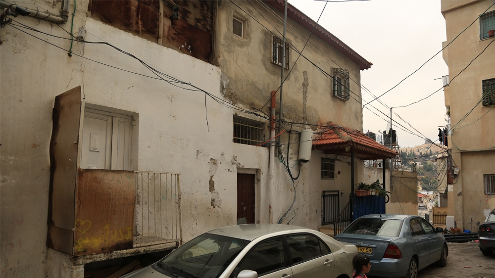 Rajabi was offered nearly $8m for his home seen on the right [Mersiha Gadzo/Al Jazeera]