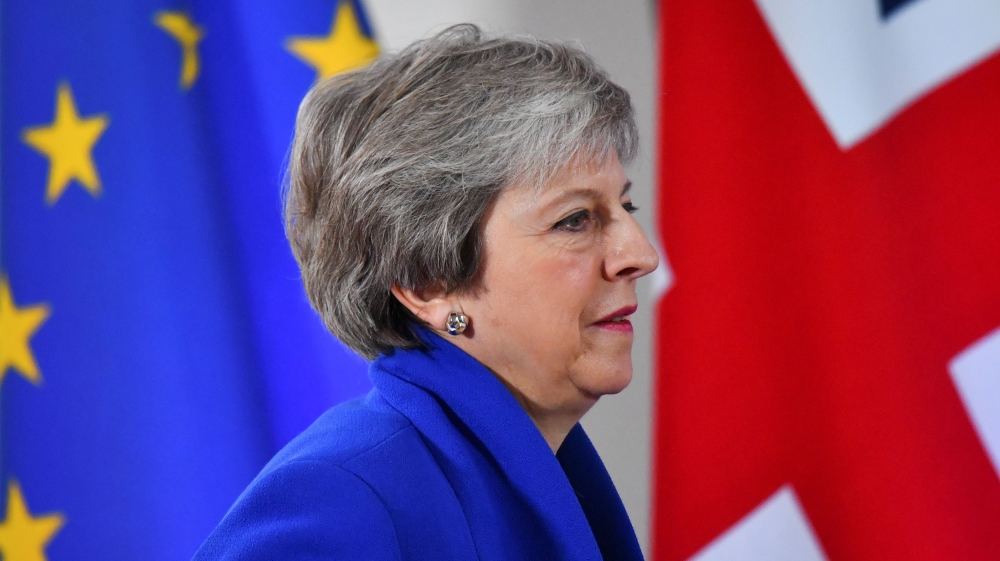 Former British Prime Minister Theresa May failed to get parliamentary approval for the withdrawal agreement her administration brokered with Brussels [File: Dylan Martinez/Reuters]