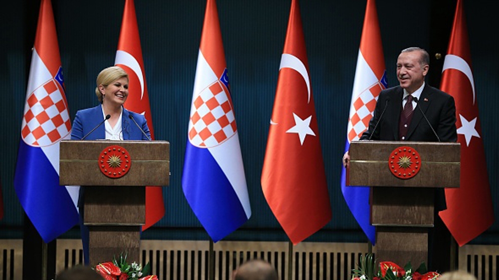During Bosnia's election campaign, the Croatian President also sought the Turkish president's support in changing the electoral law during a visit to Ankara in January 2018 [Murat Cetinmuhurdar/Anadolu Agency/Getty Images]