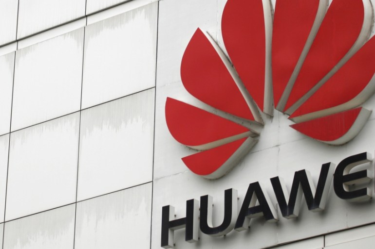 FILE PHOTO: The logo of the Huawei Technologies Co. Ltd. is seen outside its headquarters in Shenzhen, Guangdong province