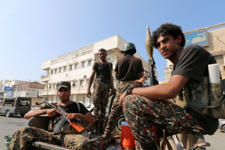 FILE PHOTO: Houthi militants patrol a street where pro-Houthi demonstrated in Hodeidah