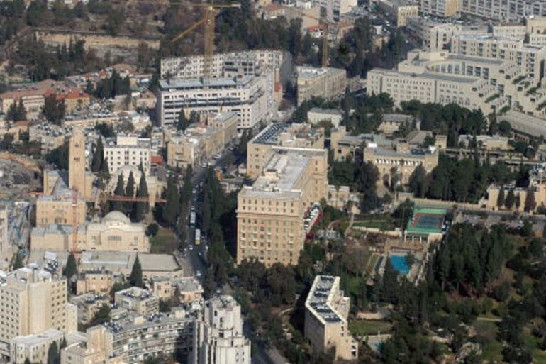 An aerial view shows west Jerusalem with An aerial view shows west Jerusalem with the YMCA clocktower (L), King David hotel (C), the French Consulate (R) and the Hilton (top R) on January 11, 2010.