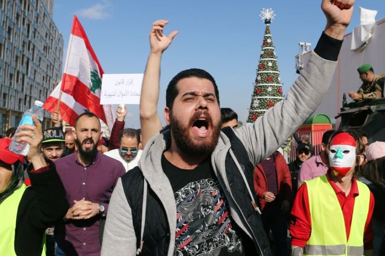 A man gestures as he takes part in a protest over the Lebanon''s economy and politics in Beirut