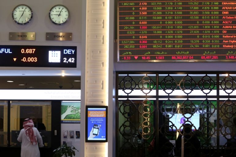 An investor is seen at the Dubai International Financial Market, in Dubai