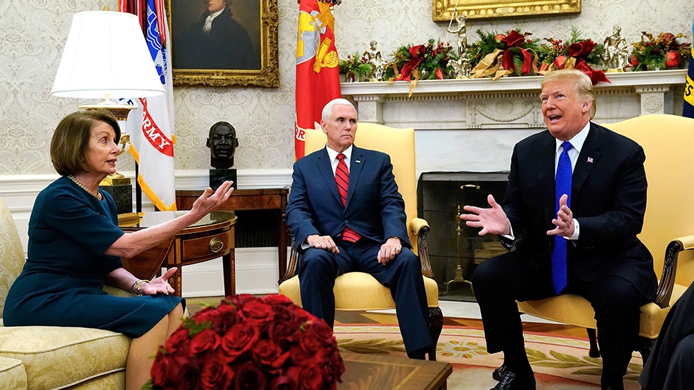 Nancy Pelosi speaks with Vice President Mike Pence and Trump as they meet her and Senate Minority Leader Chuck Schumer in the Oval Office at the White House in Washington, US [Kevin Lamarque/Reuters] 