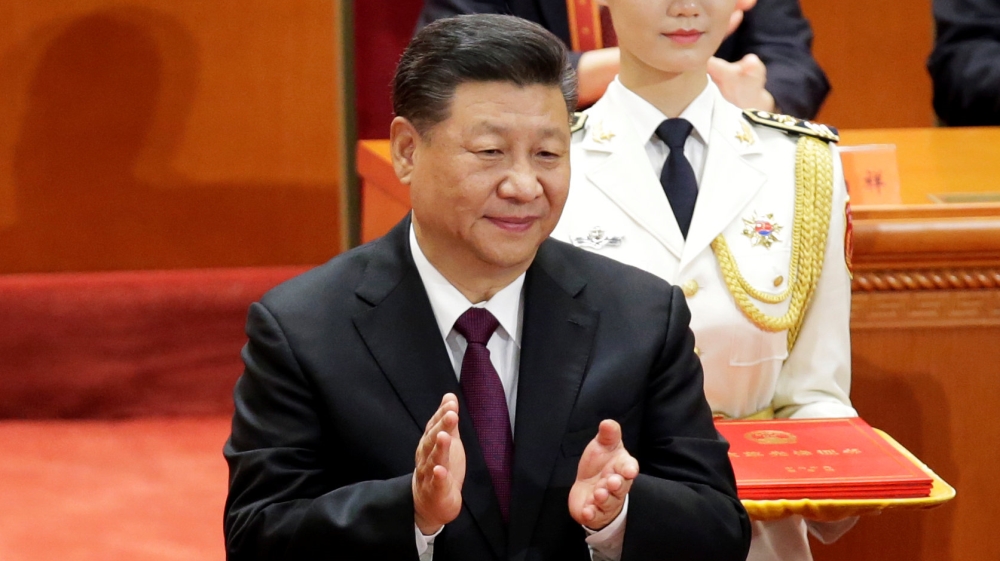 China's parliament in March scrapped presidential term limits, paving the way for President Xi Jinping to rule indefinitely [Jason Lee/Reuters]