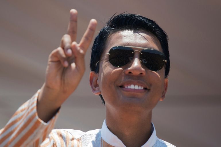 Andry Rajoelina, president of Madagascar, salutes supporters in a 2018 campaign rally