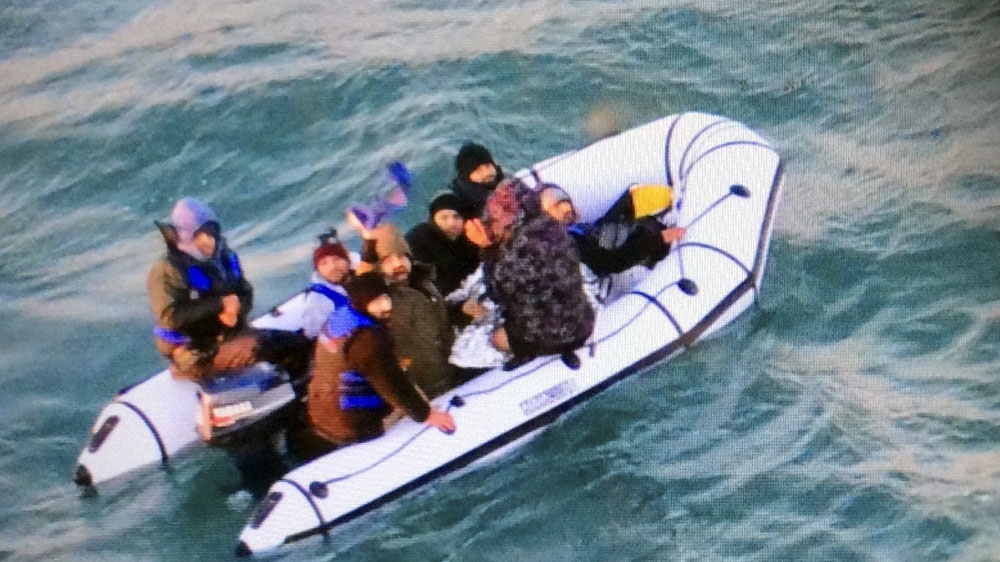 French authorities rescued eight migrants off the port of Calais [Marine Nationale via AP]