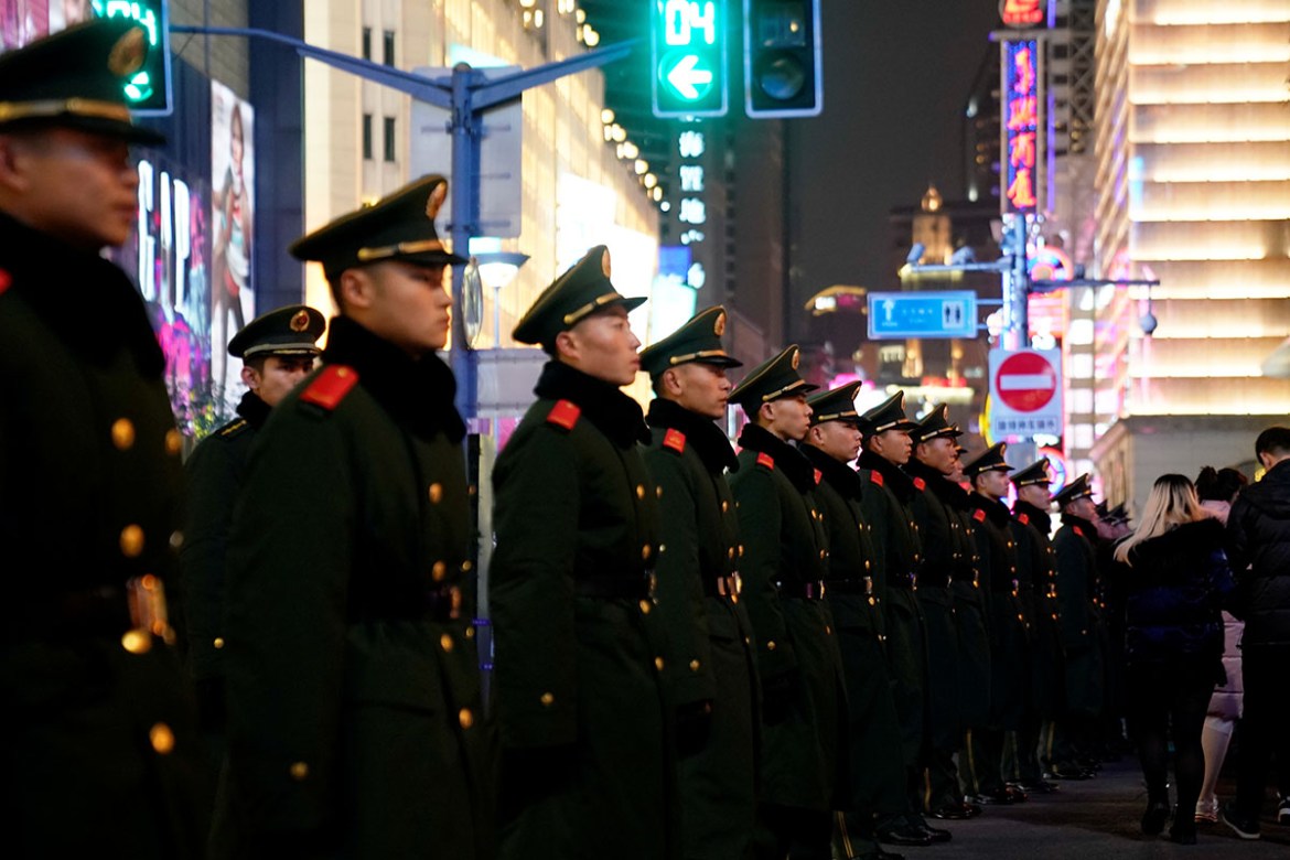 Paramilitary police stand guard near the Bund on New Year''s Eve, in Shanghai, China December 31, 2018. REUTERS/Aly Song