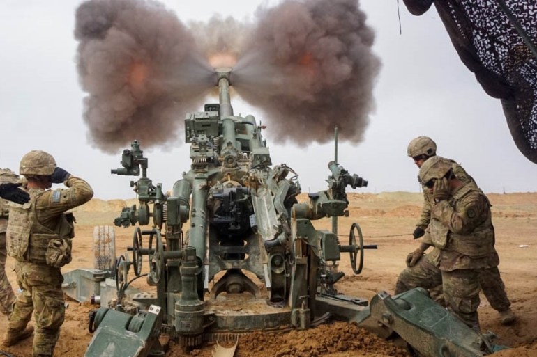 U.S. Army troopers assigned to the Field Artillery Squadron, 3rd Cavalry Regiment, fire their M777 Howitzer on Firebase Saham, Iraq [Courtesy:  CPT Jason Welch / DVIDS]
