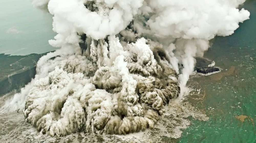 A plume of ash rises as Anak Krakatoa erupts on December 23 [Susi Air viaReuters]